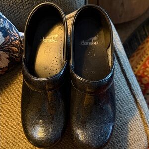 Dansko Glittery Black Clogs